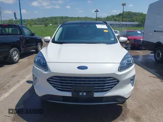 2021 Ford Escape Titanium with VIN 1FMCU9J91MUA29407, listed as a IAAI auction lot 42120442 with 19,314 mi miles and . Bid and sale history available at DreamBid. Image 12.