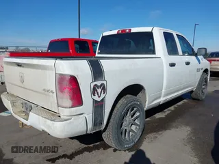 2014 Ram 1500 Express with VIN 1C6RR7FTXES119572, listed as a IAAI auction lot 41655142 with 143,232 mi miles. Bid and sale history available at carsss.com. Image 4.
