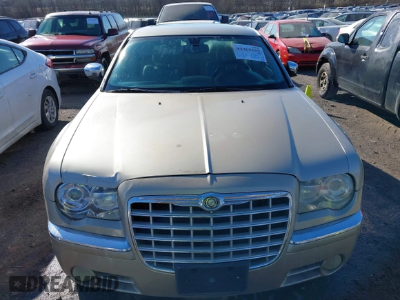 2006 Chrysler 300 C with VIN 2C3KK63H66H374760, listed as a IAAI auction lot 41365655 with 186,900 mi miles. Bid and sale history available at carsss.com. Image 6.