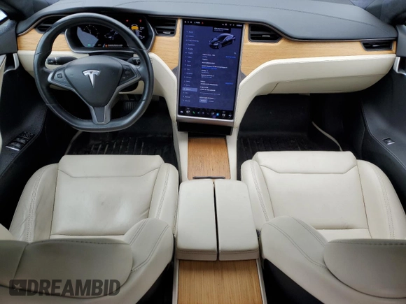 2019 Tesla Model S 75D with VIN 5YJSA1E28KF349241, listed as a Copart auction lot 55279595 with 77,005 mi miles and Salvage title. Bid and sale history available at DreamBid. Image 8.
