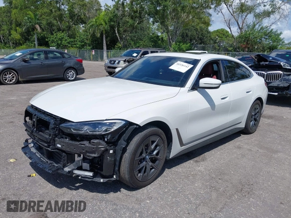 2024 BMW i4 eDrive35 z VIN WBY43AW02RFR51721, wystawiony jako IAAI lot #40336142 z przebiegiem 20 090 mil mil oraz . Historia ofert i sprzedaży dostępna na DreamBid. Obrazek 2.