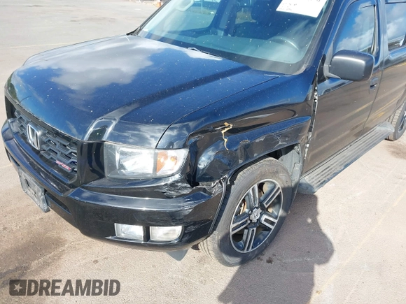 2013 Honda Ridgeline Sport with VIN 5FPYK1F70DB011814, listed as a IAAI auction lot 41689579 with 136,251 mi miles and . Bid and sale history available at DreamBid. Image 6.