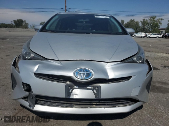 2016 Toyota Prius Two z VIN JTDKBRFU0G3003443, wystawiony jako Copart lot #55075345 z przebiegiem 183 167 mil mil oraz Szkoda całkowita • Salvage title. Historia ofert i sprzedaży dostępna na DreamBid. Obrazek 5.
