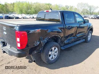 2021 Ford Ranger XL with VIN 1FTER4FHXMLD50868, listed as a IAAI auction lot 42128556 with 99,164 mi miles and . Bid and sale history available at DreamBid. Image 6.