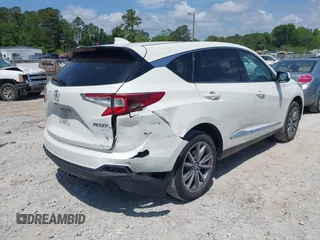 2019 Acura RDX Technology with VIN 5J8TC1H53KL007506, listed as a IAAI auction lot 42158315 with 123,323 mi miles and . Bid and sale history available at DreamBid. Image 4.