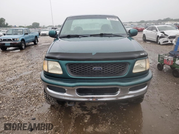 1998 Ford F-150 with VIN 1FTZF18W8WKA89592, listed as a Copart auction lot 65345104 with 166,758 mi miles and Salvage title. Bid and sale history available at DreamBid. Image 5.