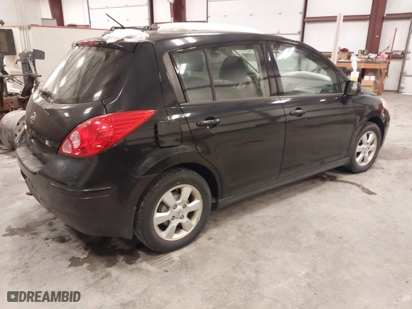 2009 Nissan Versa 1.8 S with VIN 3N1BC13E99L393142, listed as a IAAI auction lot 41377246 with 115,591 mi miles. Bid and sale history available at carsss.com. Image 4.