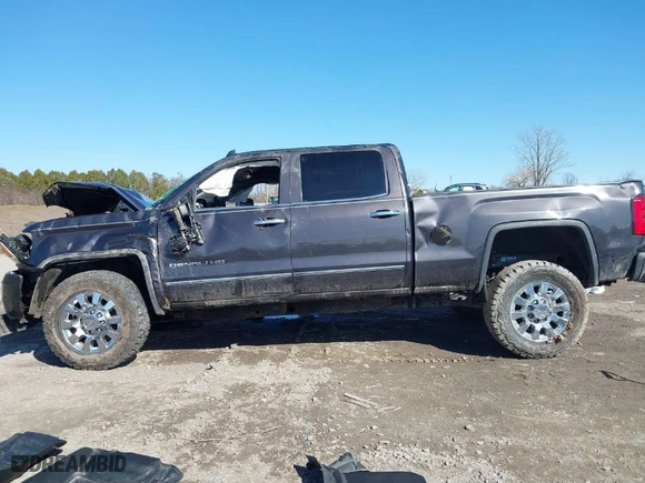 2015 GMC Sierra 2500HD available WiFi Denali with VIN 1GT120E82FF573243, listed as a IAAI auction lot 41824163 with 67,285 mi miles. Bid and sale history available at carsss.com. Image 14.