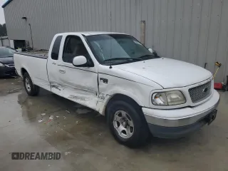 1999 Ford F-150 z VIN 1FTRX17WXXNC10010, wystawiony jako Copart lot #55607785 z przebiegiem Nie podano mil oraz Szkoda całkowita • Salvage title. Historia ofert i sprzedaży dostępna na DreamBid. Obrazek 4.