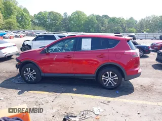 2016 Toyota RAV4 LE with VIN JTMZFREV1GJ098247, listed as a IAAI auction lot 42065800 with 199,172 mi miles and . Bid and sale history available at DreamBid. Image 14.
