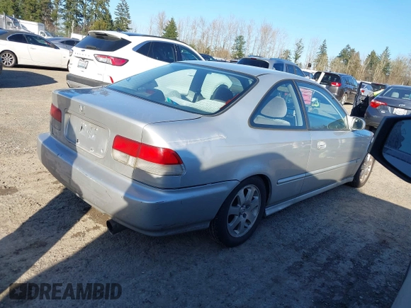 1999 Honda Civic DX with VIN 1HGEJ6120XL034343, listed as a IAAI auction lot 41691134 with 21,882 mi miles. Bid and sale history available at carsss.com. Image 4.