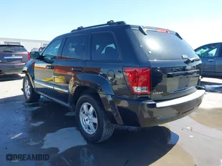2010 Jeep Grand Cherokee Laredo with VIN 1J4PS4GK9AC101152, listed as a IAAI auction lot 41706626 with 182,265 mi miles. Bid and sale history available at carsss.com. Image 3.