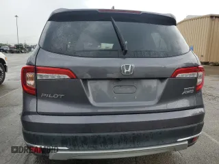 2020 Honda Pilot Touring 7-Passenger z VIN 5FNYF6H68LB052379, wystawiony jako Copart lot #57655775 z przebiegiem 73 501 mil mil oraz Szkoda całkowita • Salvage title. Historia ofert i sprzedaży dostępna na DreamBid. Obrazek 6.