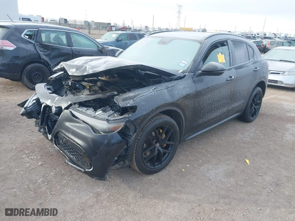 2018 Alfa Romeo Stelvio Ti Sport with VIN ZASFAKNN5J7B99778, listed as a IAAI auction lot 41257878 with 92,495 mi miles. Bid and sale history available at carsss.com. Image 17.