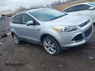2013 Ford Escape Titanium with VIN 1FMCU9J90DUC22888, listed as a IAAI auction lot 41664550 with 185,568 mi miles and . Bid and sale history available at DreamBid. Image 1.