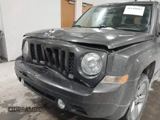 2016 Jeep Patriot High Altitude Edition with VIN 1C4NJRFB0GD632774, listed as a IAAI auction lot 41149683 with 96,495 mi miles. Bid and sale history available at carsss.com. Image 6.