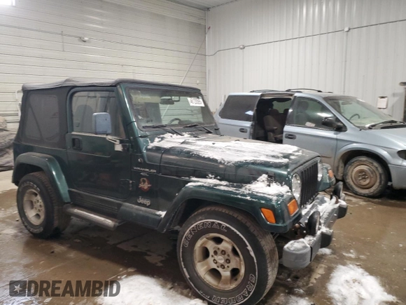 1999 Jeep Wrangler Sahara with VIN 1J4FY49SXXP451964, listed as a Copart auction lot 46120595 with 162,944 mi miles and Clean Title. Bid and sale history available at carsss.com. Image 4.