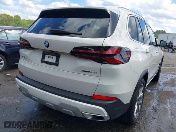 2024 BMW X5 xDrive40i z VIN 5UX23EU05R9S29952, wystawiony jako IAAI lot #42177371 z przebiegiem 26 832 mil mil oraz . Historia ofert i sprzedaży dostępna na DreamBid. Obrazek 16.