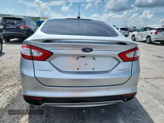2016 Ford Fusion Titanium z VIN 3FA6P0K95GR220171, wystawiony jako Copart lot #64980565 z przebiegiem 202 852 mil mil oraz Czysty tytuł • Clean title. Historia ofert i sprzedaży dostępna na DreamBid. Obrazek 6.