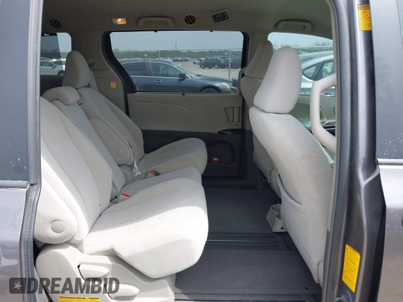 2013 Toyota Sienna LE AAS with VIN 5TDKK3DC1DS392577, listed as a IAAI auction lot 41932168 with 90,643 mi miles and . Bid and sale history available at DreamBid. Image 8.