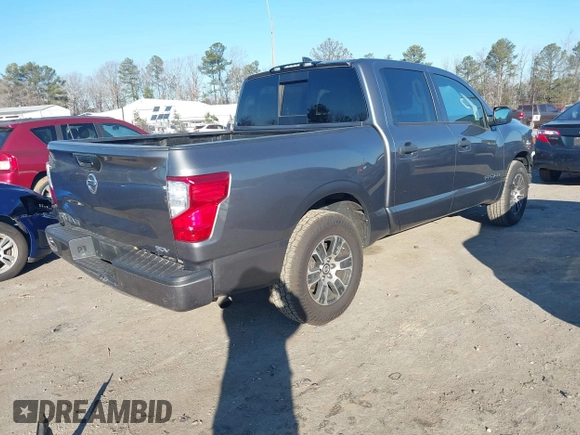 2022 Nissan Titan SV with VIN 1N6AA1EE3NN104176, listed as a IAAI auction lot 41159789 with 53,991 mi miles and . Bid and sale history available at DreamBid. Image 4.