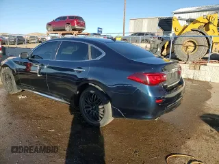 2015 Infiniti Q70 z VIN JN1BY1PR6FM830997, wystawiony jako Copart lot #41895875 z przebiegiem 203 061 mil mil oraz Szkoda całkowita • Salvage title. Historia ofert i sprzedaży dostępna na DreamBid. Obrazek 13.