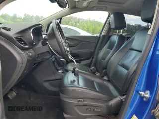 2017 Buick Encore Essence with VIN KL4CJCSB4HB058035, listed as a Copart auction lot 52089365 with 64,194 mi miles and Salvage Title. Bid and sale history available at carsss.com. Image 7.