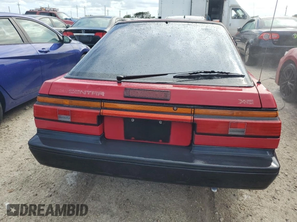 1987 Nissan Sentra z VIN JN1PB2411HU026525, wystawiony jako Copart lot #78997744 z przebiegiem 65 716 mil mil oraz Nie do naprawy • Non repairable. Historia ofert i sprzedaży dostępna na DreamBid. Obrazek 6.