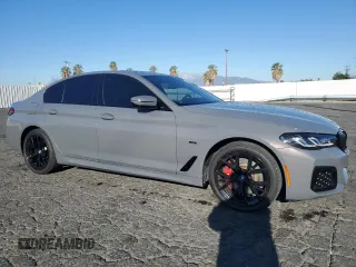 2022 BMW 5 Series 530e with VIN WBA13AG08NCL01996, listed as a Copart auction lot 89193865 with 21,314 mi miles and Salvage title. Bid and sale history available at DreamBid. Image 4.