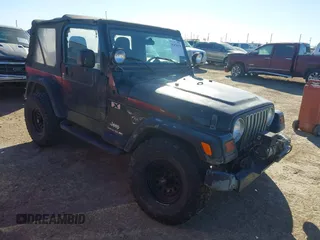 2003 Jeep Wrangler X with VIN 1J4FA39S63P330826, listed as a IAAI auction lot 41476438 with 146,517 mi miles and . Bid and sale history available at DreamBid. Image 1.