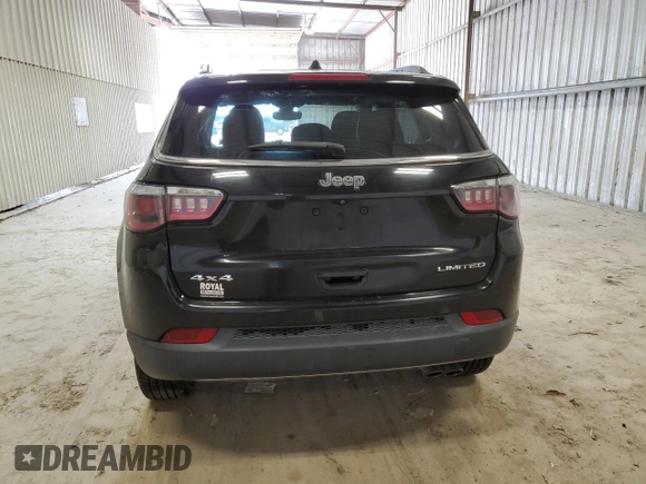 2018 Jeep Compass Limited with VIN 3C4NJDCBXJT399754, listed as a Copart auction lot 52698695 with 99,960 mi miles and Clean Title. Bid and sale history available at DreamBid. Image 6.