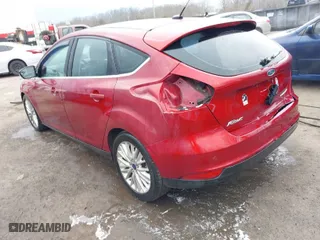 2015 Ford Focus Titanium with VIN 1FADP3N23FL248880, listed as a IAAI auction lot 41474936 with 86,245 mi miles. Bid and sale history available at carsss.com. Image 3.