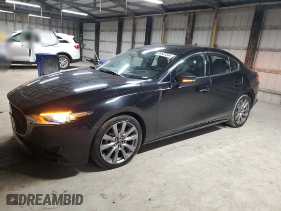 2019 Mazda 3 Premium with VIN 3MZBPAEM7KM102348, listed as a Copart auction lot 84587534 with 73,125 mi miles and Salvage Title. Bid and sale history available at DreamBid. Image 1.