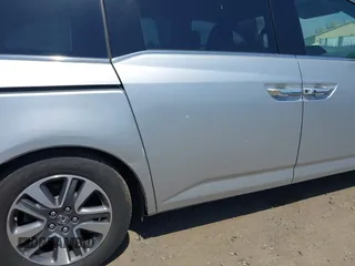 2014 Honda Odyssey Touring with VIN 5FNRL5H91EB068427, listed as a IAAI auction lot 42163315 with 184,134 mi miles and . Bid and sale history available at DreamBid. Image 18.