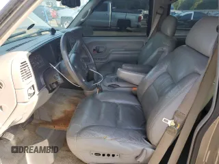 1999 Chevrolet Suburban with VIN 1GNEC16R9XJ490863, listed as a Copart auction lot 65938594 with 176,391 mi miles and Salvage Title. Bid and sale history available at carsss.com. Image 7.