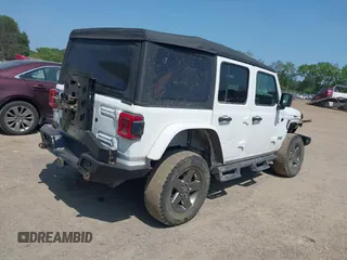 2018 Jeep Wrangler Unlimited Sport S with VIN 1C4HJXDGXJW146873, listed as a IAAI auction lot 42404813 with 73,929 mi miles and . Bid and sale history available at DreamBid. Image 4.