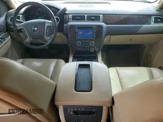 2011 GMC Yukon Denali with VIN 1GKS1EEFXBR313625, listed as a Copart auction lot 72634294 with 129,834 mi miles and Salvage Title. Bid and sale history available at carsss.com. Image 8.