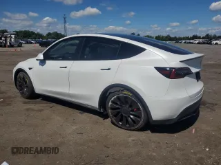 2022 Tesla Model Y Performance with VIN 7SAYGDEF9NF372337, listed as a Copart auction lot 55889345 with 51,099 mi miles and Salvage title. Bid and sale history available at DreamBid. Image 2.