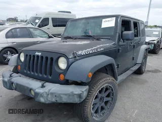2007 Jeep Wrangler Unlimited X with VIN 1J4GB391X7L172965, listed as a IAAI auction lot 42040337 with 170,482 mi miles and . Bid and sale history available at DreamBid. Image 2.