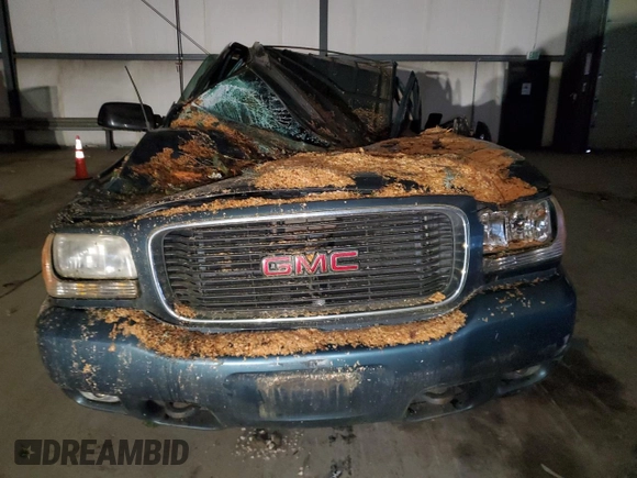 1999 GMC Denali z VIN 1GKEK13R5XR918465, wystawiony jako Copart lot #83269184 z przebiegiem Nie podano mil oraz Nie do naprawy. Historia ofert i sprzedaży dostępna na DreamBid. Obrazek 5.