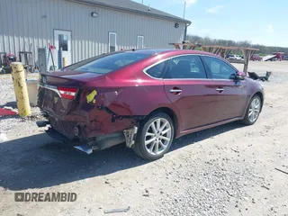 2013 Toyota Avalon XLE with VIN 4T1BK1EB2DU038939, listed as a IAAI auction lot 41983523 with 126,195 mi miles and . Bid and sale history available at DreamBid. Image 4.