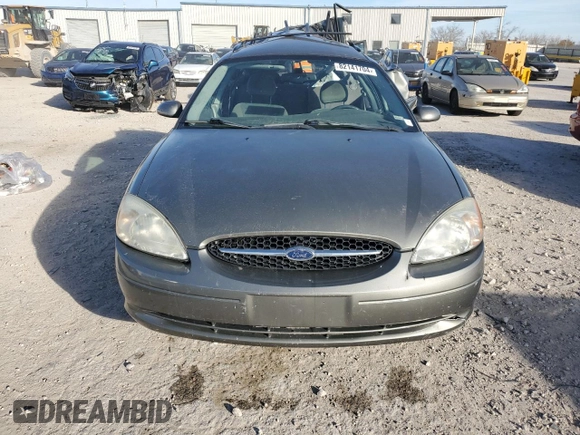 2002 Ford Taurus z VIN 1FAHP59S82A188995, wystawiony jako Copart lot #82141704 z przebiegiem 89 153 mil mil oraz Szkody całkowita. Historia ofert i sprzedaży dostępna na DreamBid. Obrazek 5.
