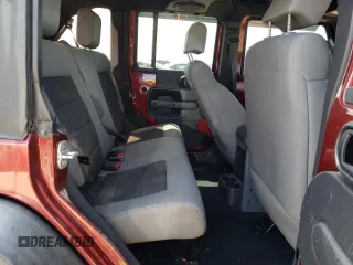 2008 Jeep Wrangler Unlimited X with VIN 1J8GA391X8L592843, listed as a Copart auction lot 53047215 with 239,726 mi miles and Salvage Title. Bid and sale history available at DreamBid. Image 10.