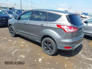 2013 Ford Escape SE with VIN 1FMCU9GX0DUA52263, listed as a IAAI auction lot 42211395 with 140,067 mi miles and . Bid and sale history available at DreamBid. Image 3.