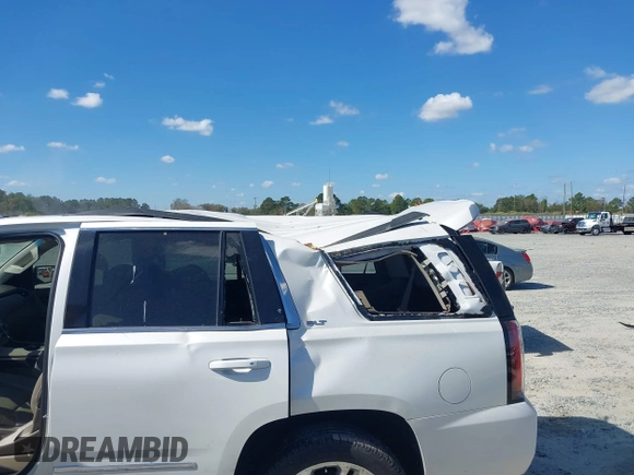 2019 GMC Yukon SLT with VIN 1GKS1BKC9KR332014, listed as a IAAI auction lot 40674460 with 76,545 mi miles. Bid and sale history available at carsss.com. Image 6.