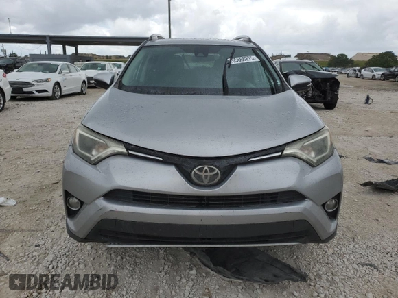 2018 Toyota RAV4 XLE with VIN 2T3WFREV4JW444884, listed as a Copart auction lot 55666275 with 174,275 mi miles and Salvage Title. Bid and sale history available at DreamBid. Image 5.