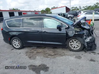 2021 Chrysler Voyager LXi z VIN 2C4RC1DG1MR515709, wystawiony jako IAAI lot #41866568 z przebiegiem 93 883 mil mil oraz . Historia ofert i sprzedaży dostępna na DreamBid. Obrazek 14.