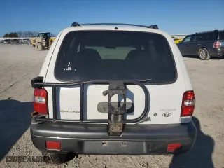 2002 Kia Sportage with VIN KNDJA723625142604, listed as a Copart auction lot 73463704 with 236,260 mi miles and Salvage Title. Bid and sale history available at carsss.com. Image 6.