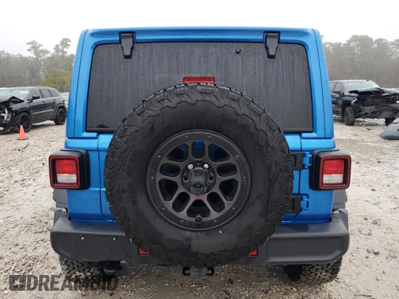 2023 Jeep Wrangler Sport S with VIN 1C4HJXDGXPW692324, listed as a Copart auction lot 41761235 with 15,660 mi miles and Salvage Title. Bid and sale history available at DreamBid. Image 6.