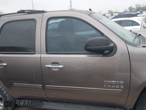 2014 Chevrolet Tahoe LT with VIN 1GNSCBE08ER106419, listed as a IAAI auction lot 41789896 with 99,420 mi miles and . Bid and sale history available at DreamBid. Image 13.